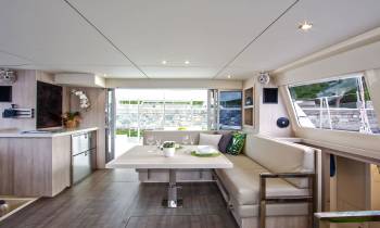 a room filled with furniture and a large window