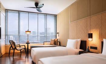 a bedroom with a bed in a hotel room