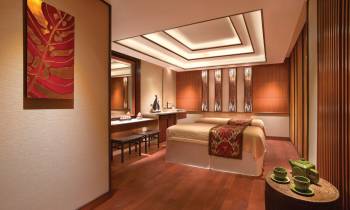 a room filled with furniture and a large window