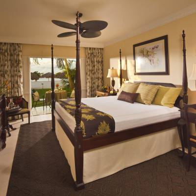 a bedroom with a large bed in a room
