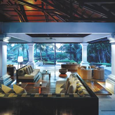 a room filled with furniture and a large window