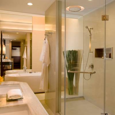 a double sink and large mirror
