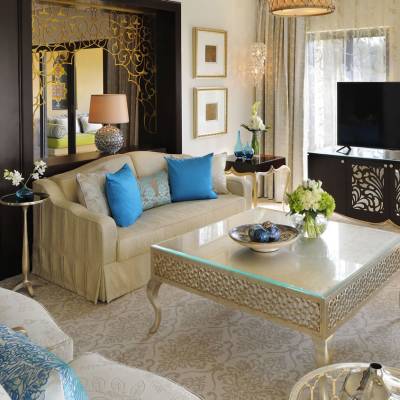 a living room filled with furniture and a fire place
