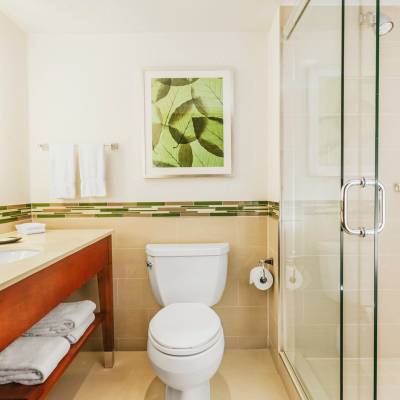 a room with a sink and a mirror