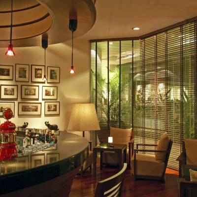 a living room filled with furniture and a large window