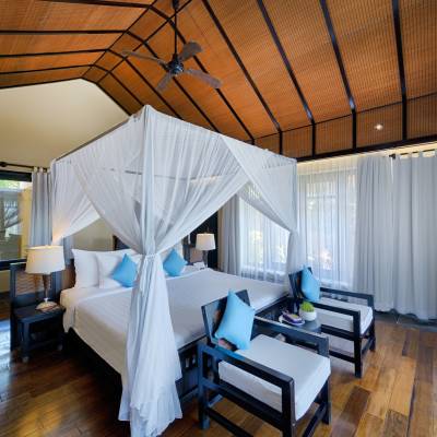 a room filled with furniture and a curtain