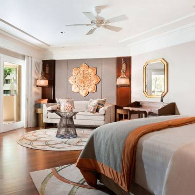 a living room filled with furniture and a large window