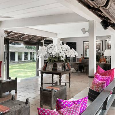 a living room filled with furniture and a fireplace