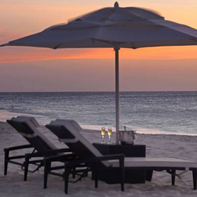 a couple of people that are set up on a beach