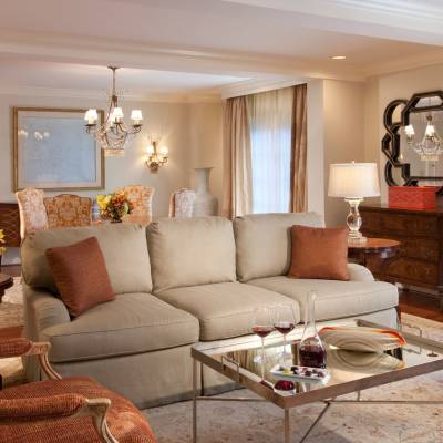 a living room filled with furniture and a fire place
