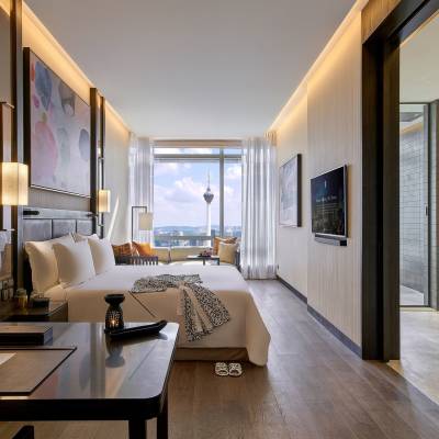 a living room filled with furniture and a large window