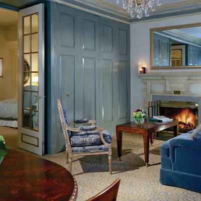 a living room filled with furniture and a large window