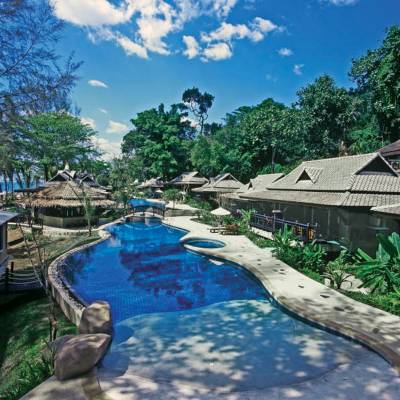 a pool next to a body of water
