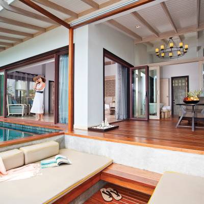 a room filled with furniture and a large window