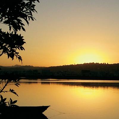 a sunset over a body of water