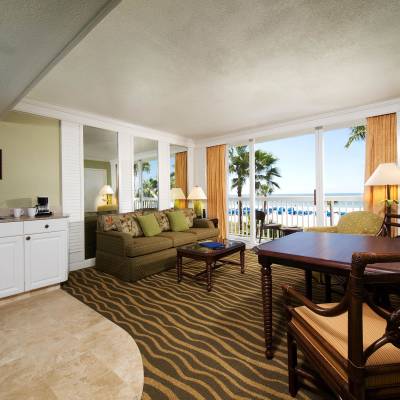 a room filled with furniture and a large window
