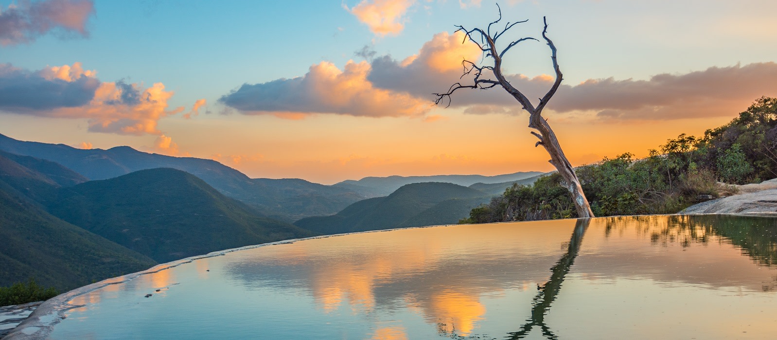 Amazing sunset over the incredible petrified waterfalls of Hierve el Agua in Oaxaca, Mexico
