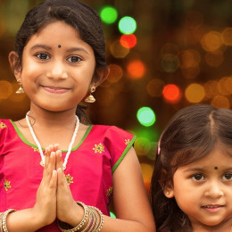 Cute Indian girls greeting you for Diwali - India travel guide