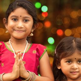 Cute Indian girls greeting you for Diwali - India travel guide
