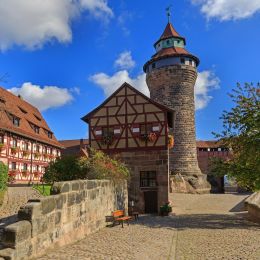 Nuremberg Castle (Sinwell tower) with blue sky and clouds, Germany Tours