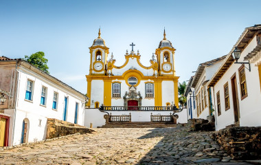 Colorful colonial houses and church in city of Tiradentes