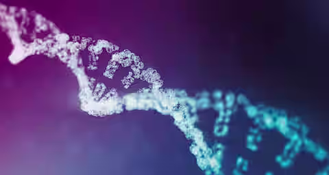 A digital representation of a DNA double helix, with glowing particles forming the iconic twisted ladder shape. The background is a gradient of blue and purple, giving a futuristic and scientific feel to the image.