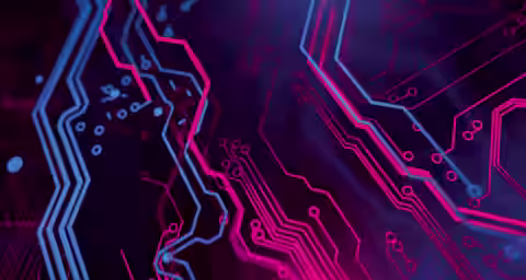 Abstract close-up of a circuit board design with glowing blue and pink lines interwoven against a dark background. The lines create intricate, futuristic patterns, highlighting the complexity of the electronic components.