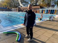 Jane Swimming Coach standing on poolside