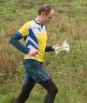 Man running with map in hand