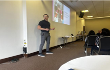 Community Sports Manager Aaron Colbert delivering his presentation Community Sports Manager Aaron Colbert delivering his presentation