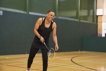 woman playing badminton