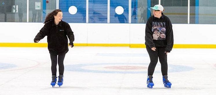 man and woman skating