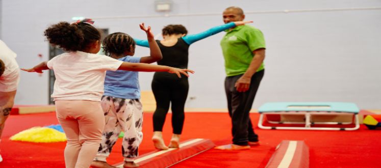 An image of a gymnastics class in session