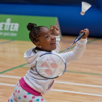 Girl playing Badminton