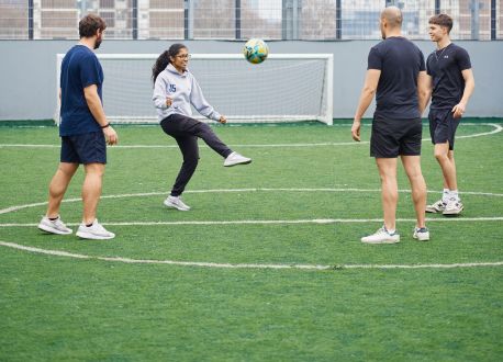 group playing football