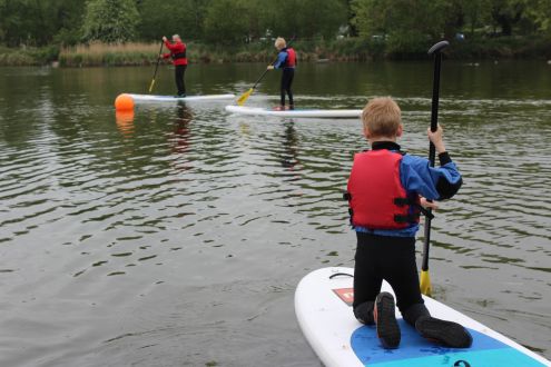 young paddle boarders on Stanborough Lake