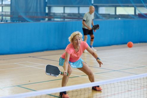 woman playing pickleball