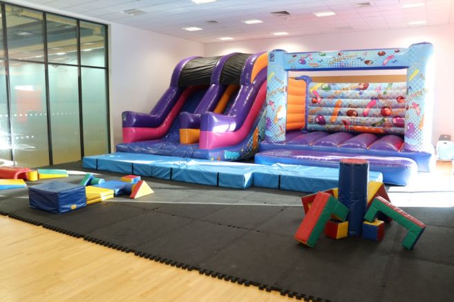 Studio Space - Birthday party layout with inflatables and soft toys