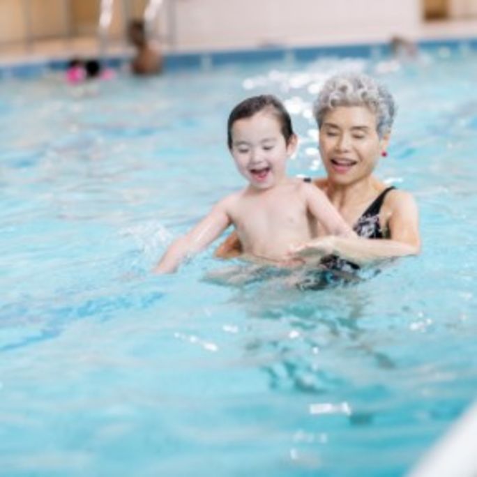 Baby swimming grandparent Baby swimming grandparent