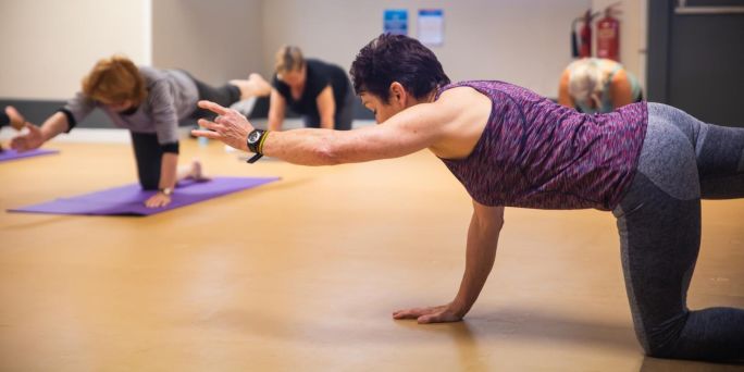 people working out in a Pilates class
