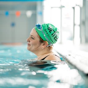 Woman swimming in Better pool