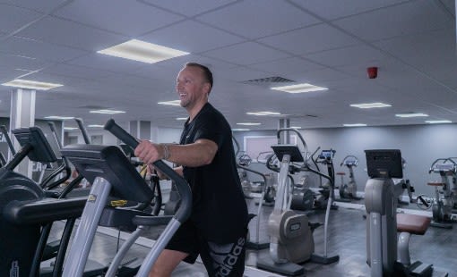 Image of better gym member steve on a cross trainer in the gym