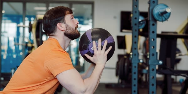 Man doing wall balls