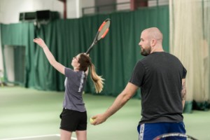 Group playing tennis