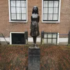 Bronze Sculpture of Anne Frank in Front of the Anne Frank House