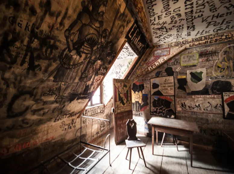 Attic Room with Graffiti on the Walls