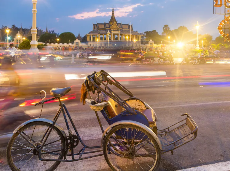 Bike on Street in Front of Temple at Phnom Penh during Evening