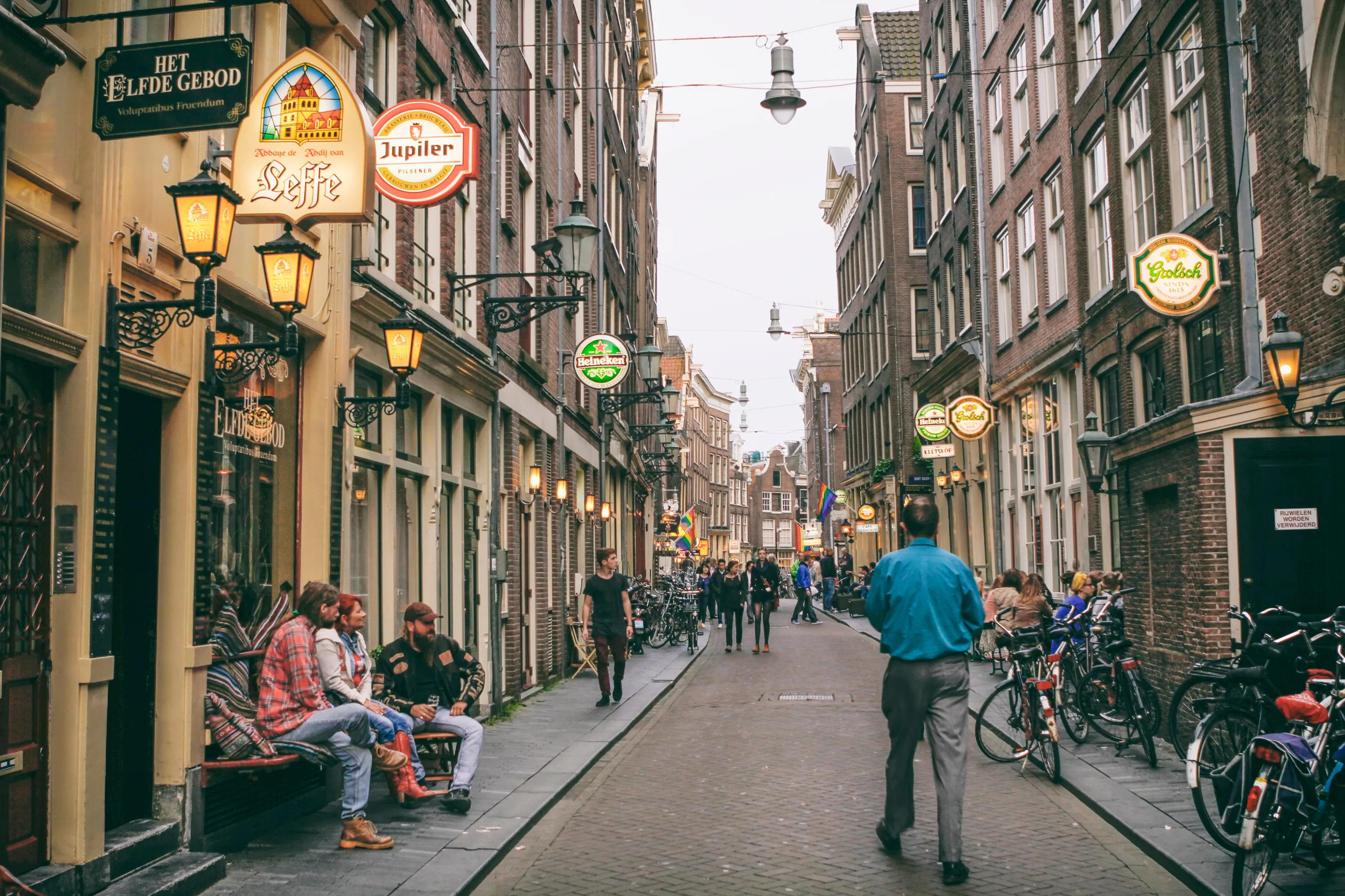 Old Fashioned Signs and Gas Lamps on a Street in Amsterdam