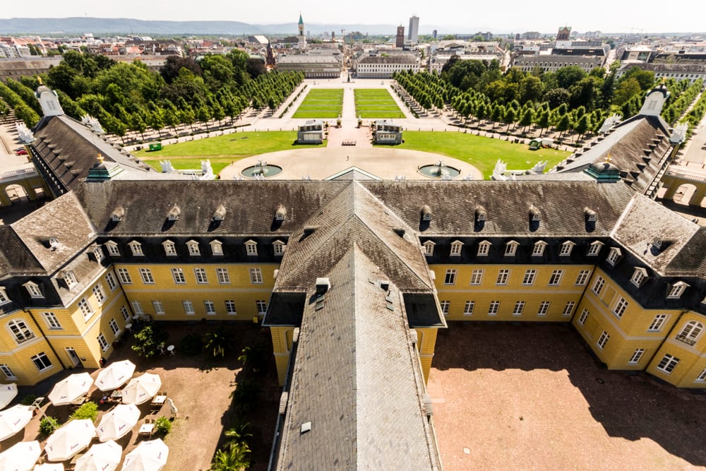 A Large Palace Extending around a Formal Garden