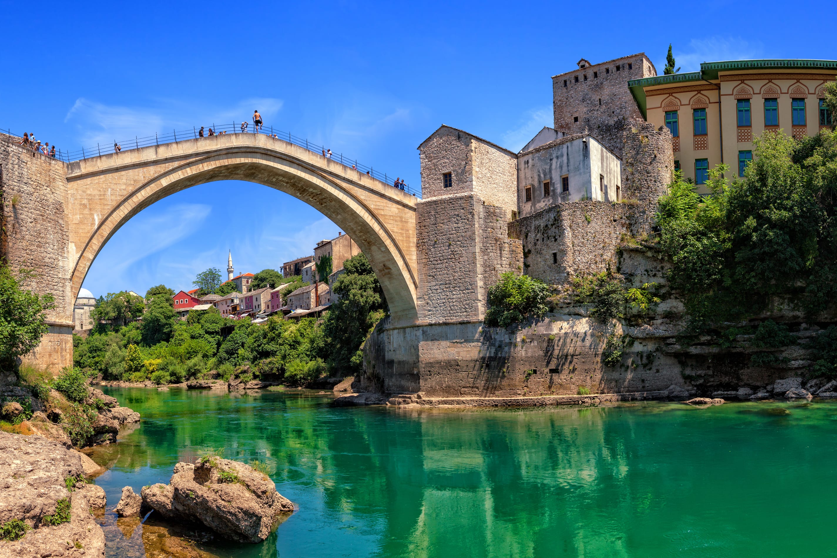 An Arched Medieval Bridge Overlooking Emerald Waters